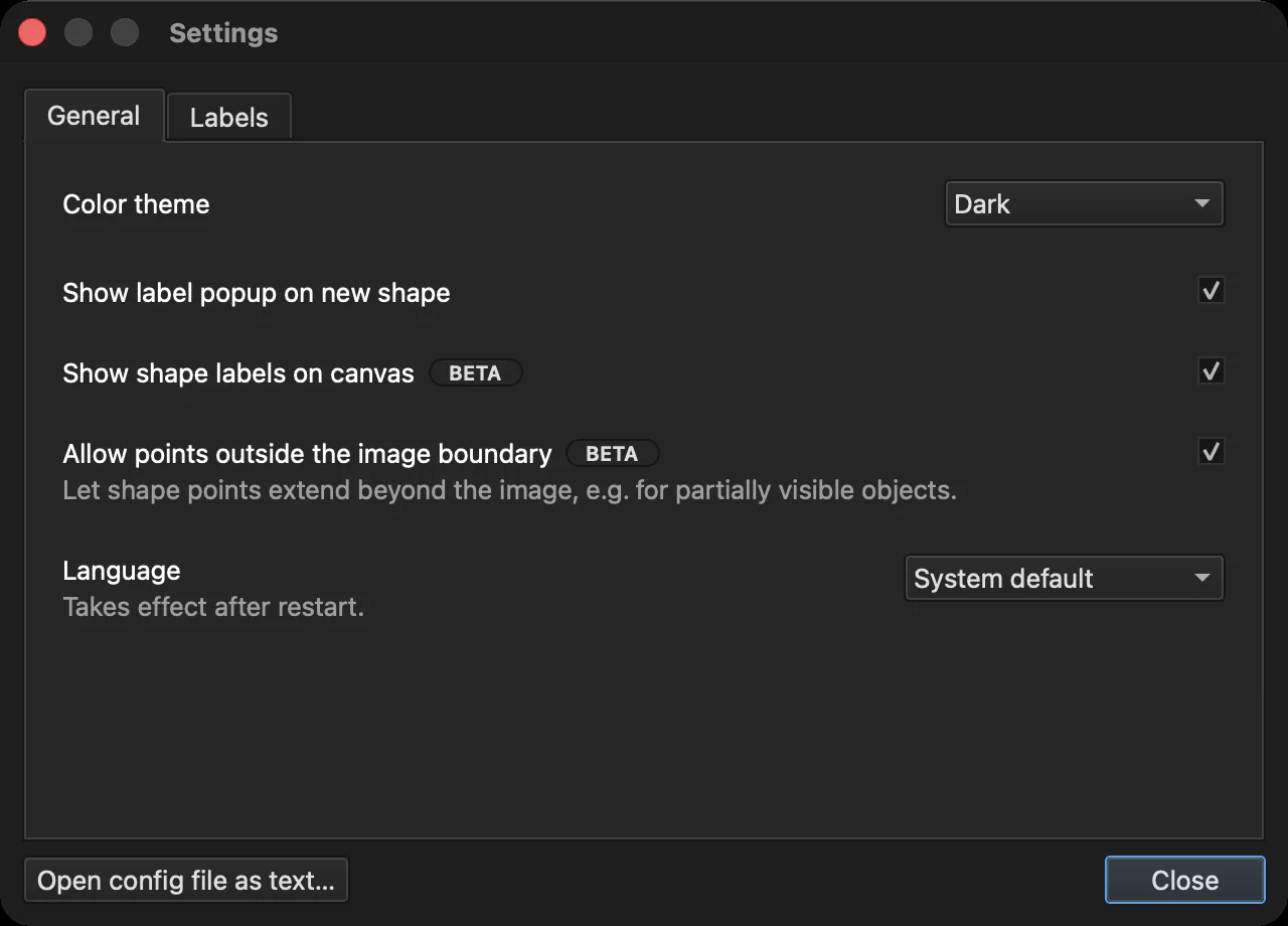 LabelMe v7 Settings dialog in dark mode: a Color theme picker set to Dark, checkboxes for Show shape labels on canvas and Allow points outside the image boundary each with a BETA badge, and a Language picker